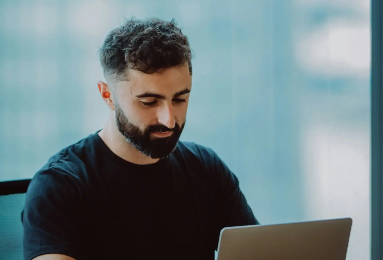 Recruiter working through a structured CV formatting workflow